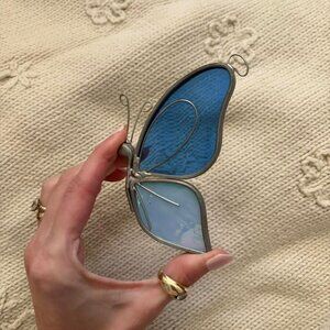 Blue stained glass butterfly suncatcher